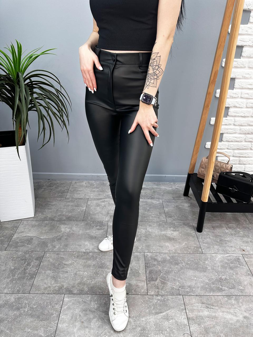 Шкіряні штани з кишенями "Kors"